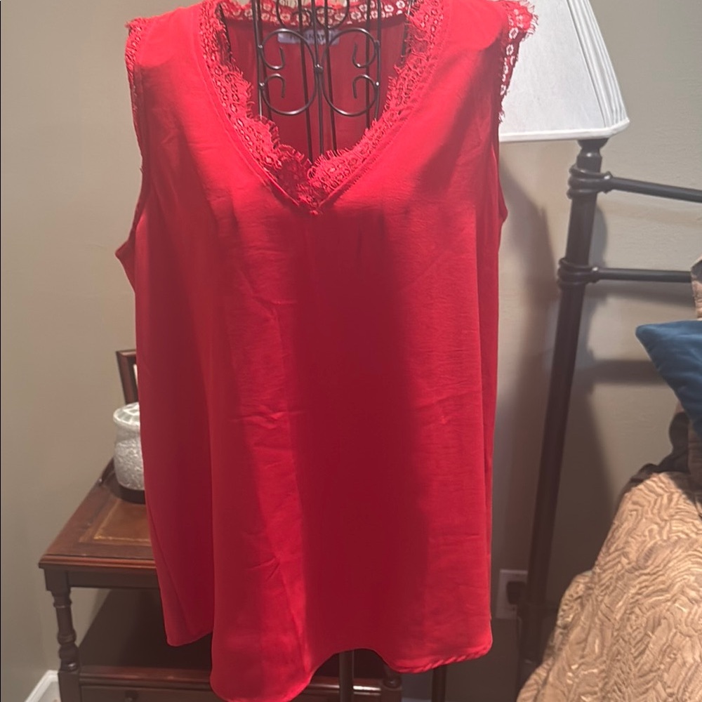 Vibrant Red Sleeveless Blouse with Black Accents